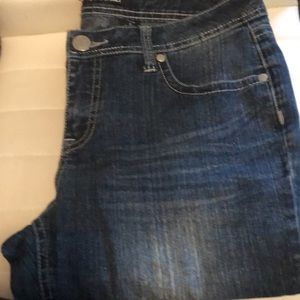 Vintage denim brand Roz and Ali back pocket with gemstone design inseam waist 28